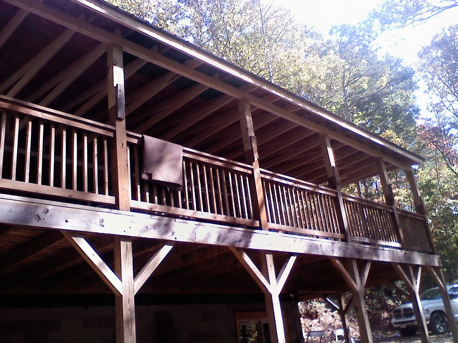 Timber framing under a new elevated porch and deck — Roof Leak Repair in Lehi by Roofing Brothers